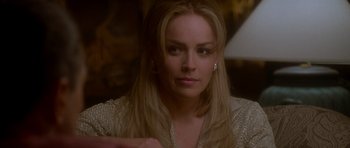 Movie still from “Casino” (1995), directed by Martin Scorsese – A person with long blonde hair; Close Up shot, Over the shoulder angle