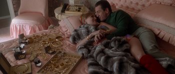 Movie still from “Casino” (1995), directed by Martin Scorsese – A man and a woman laying in a bed; Medium shot, Overhead angle