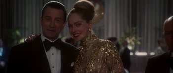 Movie still from “Casino” (1995), directed by Martin Scorsese – A man and a woman in formal attire; Close Up shot, Low angle