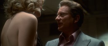 Movie still from “Casino” (1995), directed by Martin Scorsese – A man and a woman talking to each other; Close Up shot, Low angle