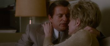 Movie still from “Casino” (1995), directed by Martin Scorsese – An older man wearing a suit and tie; Close Up shot, Low angle