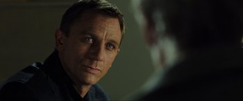 Movie still from “Casino Royale” (2006), directed by Martin Campbell – A person looking at the camera; Close Up shot, Over the shoulder angle
