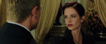 Movie still from “Casino Royale” (2006), directed by Martin Campbell – A man and a woman sitting in front of each other; Close Up shot, Over the shoulder angle