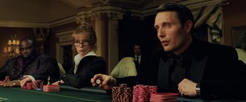 Movie still from “Casino Royale” (2006), directed by Martin Campbell – A man and a woman sitting at a poker table; Close Up shot, Over the shoulder angle
