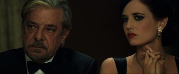 Movie still from “Casino Royale” (2006), directed by Martin Campbell – A man and a woman sitting next to each other; Close Up shot, Over the shoulder angle