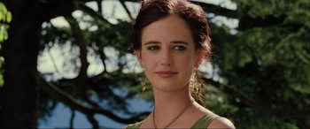 Movie still from “Casino Royale” (2006), directed by Martin Campbell – A beautiful young lady wearing a green shirt; Close Up shot, Low angle