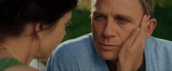 Movie still from “Casino Royale” (2006), directed by Martin Campbell – A person with his hand under his chin; Close Up shot, Over the shoulder angle