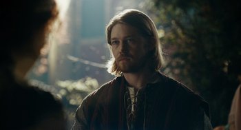 A person with long blonde hair