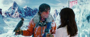 Movie still from “The Secret Life of Walter Mitty” (2013), directed by Ben Stiller – A man in a red jacket is holding a drink; Close Up shot, Over the shoulder angle