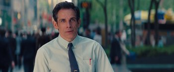 Movie still from “The Secret Life of Walter Mitty” (2013), directed by Ben Stiller – Ben stiller in a white dress shirt and blue tie; Close Up shot, Over the shoulder angle