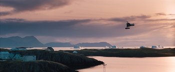 Movie still from “The Secret Life of Walter Mitty” (2013), directed by Ben Stiller – A body of water surrounded by mountains under a cloudy sky; Extreme Wide shot, Low angle
