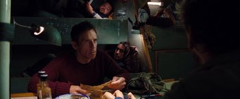 Movie still from “The Secret Life of Walter Mitty” (2013), directed by Ben Stiller – A man sitting at a table with a sandwich in front of him; Medium shot, High angle