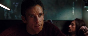 Movie still from “The Secret Life of Walter Mitty” (2013), directed by Ben Stiller – A person wearing a red sweater; Close Up shot, Over the shoulder angle