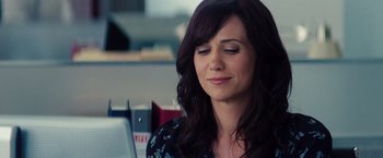 Movie still from “The Secret Life of Walter Mitty” (2013), directed by Ben Stiller – A person sitting in front of a window; Close Up shot, Over the shoulder angle