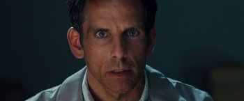 Movie still from “The Secret Life of Walter Mitty” (2013), directed by Ben Stiller – A person wearing a white shirt; Close Up shot, Over the shoulder angle