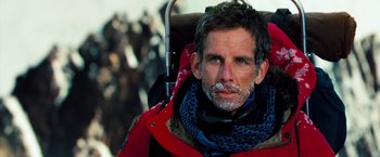 Movie still from “The Secret Life of Walter Mitty” (2013), directed by Ben Stiller – A person wearing a jacket and scarf; Close Up shot, Over the shoulder angle