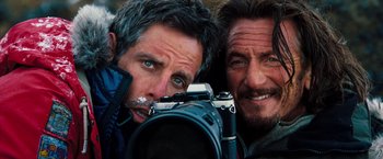 Movie still from “The Secret Life of Walter Mitty” (2013), directed by Ben Stiller – Two men are taking a picture with a camera; Close Up shot, Low angle