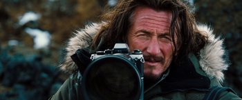 Movie still from “The Secret Life of Walter Mitty” (2013), directed by Ben Stiller – A person holding a camera; Close Up shot, Low angle