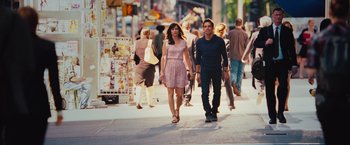 Movie still from “The Secret Life of Walter Mitty” (2013), directed by Ben Stiller – A man and a woman walking down a street; Wide shot, Over the shoulder angle