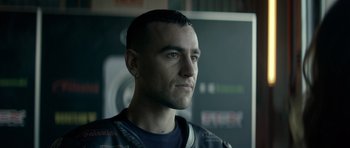 Movie still from “Centaur” (2022), directed by Daniel Calparsoro – A person wearing a jacket; Close Up shot, Low angle