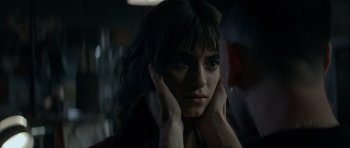 Movie still from “Centaur” (2022), directed by Daniel Calparsoro – A person with their hands on their head; Close Up shot, Over the shoulder angle