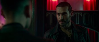 Movie still from “Centaur” (2022), directed by Daniel Calparsoro – A person wearing a black jacket; Close Up shot, Over the shoulder angle