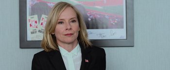 Movie still from “Central Intelligence” (2016), directed by Rawson Marshall Thurber – A person wearing a suit and tie; Close Up shot, Over the shoulder angle