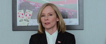 Movie still from “Central Intelligence” (2016), directed by Rawson Marshall Thurber – A person wearing a suit and tie; Close Up shot, Over the shoulder angle