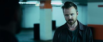 Movie still from “Central Intelligence” (2016), directed by Rawson Marshall Thurber – A person wearing a black shirt; Close Up shot, Over the shoulder angle