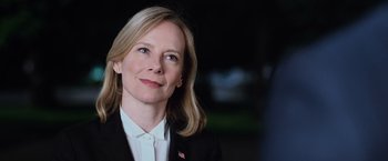 Movie still from “Central Intelligence” (2016), directed by Rawson Marshall Thurber – A person wearing a suit and tie; Close Up shot, Over the shoulder angle