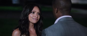 Movie still from “Central Intelligence” (2016), directed by Rawson Marshall Thurber – A woman standing next to a man in a suit; Close Up shot, Over the shoulder angle