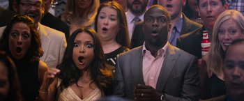 Movie still from “Central Intelligence” (2016), directed by Rawson Marshall Thurber – A group of people that are standing in a room; Close Up shot, Low angle