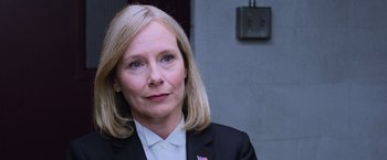 Movie still from “Central Intelligence” (2016), directed by Rawson Marshall Thurber – A person wearing a suit and tie; Close Up shot, Over the shoulder angle