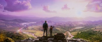 Movie still from “Central Intelligence” (2016), directed by Rawson Marshall Thurber – A man and a child standing on top of a mountain; Extreme Wide shot, Low angle