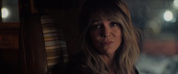 Movie still from “Champions” (2023), directed by Bobby Farrelly – A person with long hair; Close Up shot, Over the shoulder angle