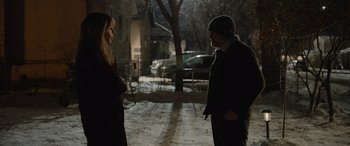 Movie still from “Champions” (2023), directed by Bobby Farrelly – A man and a woman standing in the snow; Medium shot, Over the shoulder angle