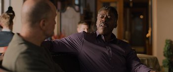Movie still from “Champions” (2023), directed by Bobby Farrelly – An older man is talking to a younger man; Close Up shot, Over the shoulder angle