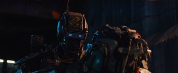 Movie still from “Chappie” (2015), directed by Neill Blomkamp – A remote control device in a dark room; Close Up shot, Low angle