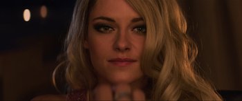 Movie still from “Charlie's Angels” (2019), directed by Elizabeth Banks – A woman's face with long blonde hair; Close Up shot, Overhead angle