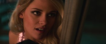 Movie still from “Charlie's Angels” (2019), directed by Elizabeth Banks – A woman's face looking at the camera; Close Up shot, Overhead angle