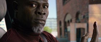 Movie still from “Charlie's Angels” (2019), directed by Elizabeth Banks – A person with a beard; Close Up shot, Low angle