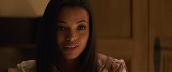 Movie still from “Charlie's Angels” (2019), directed by Elizabeth Banks – A person with long hair; Close Up shot, Over the shoulder angle