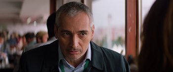 Movie still from “Charlie's Angels” (2019), directed by Elizabeth Banks – A person wearing a shirt and jacket; Close Up shot, Low angle