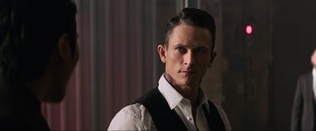 Movie still from “Charlie's Angels” (2019), directed by Elizabeth Banks – A person wearing a shirt and tie; Close Up shot, Low angle