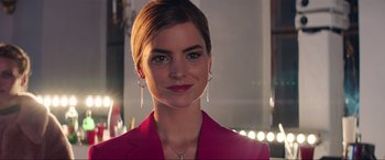 Movie still from “Charlie's Angels” (2019), directed by Elizabeth Banks – A person wearing a suit; Close Up shot, Low angle