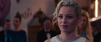 Movie still from “Charlie's Angels” (2019), directed by Elizabeth Banks – A person wearing a dress; Close Up shot, Over the shoulder angle