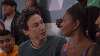 Movie still from “Cheaper by the Dozen” (2022), directed by Gail Lerner – A man and a woman talking to each other; Close Up shot, Over the shoulder angle