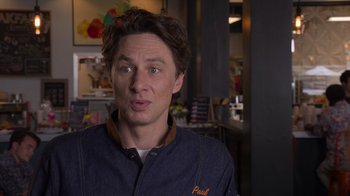 Movie still from “Cheaper by the Dozen” (2022), directed by Gail Lerner – A person wearing a jacket; Close Up shot, Over the shoulder angle