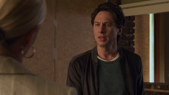 Movie still from “Cheaper by the Dozen” (2022), directed by Gail Lerner – A man in a green shirt is talking to a woman; Close Up shot, Over the shoulder angle