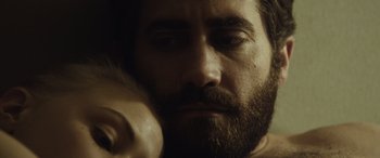 Movie still from “Enemy” (2013), directed by Denis Villeneuve – A person with a beard; Close Up shot, Low angle